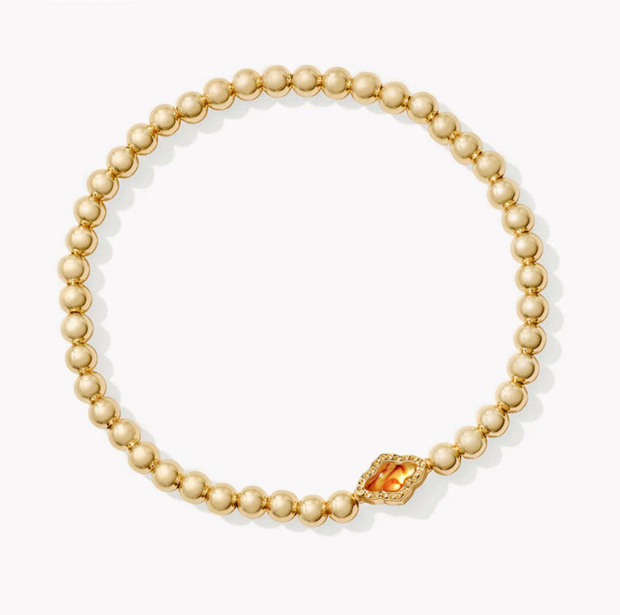 KENDRA SCOTT Abbie Gold Beaded Stretch Bracelet in Marbled Amber 9608872851