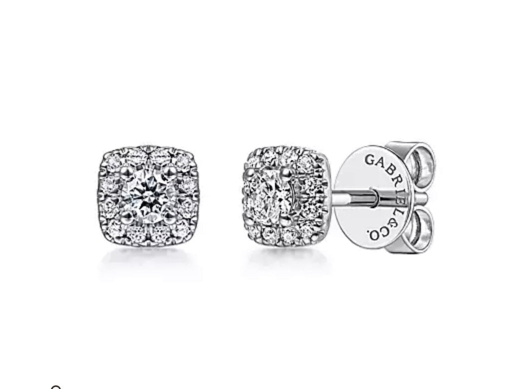 GABRIEL&Co. Cushion shaped halos accent the 0.08ct round cut center diamonds in these brilliant 0.26ct in total stud earrings. EG13215W45KJJ